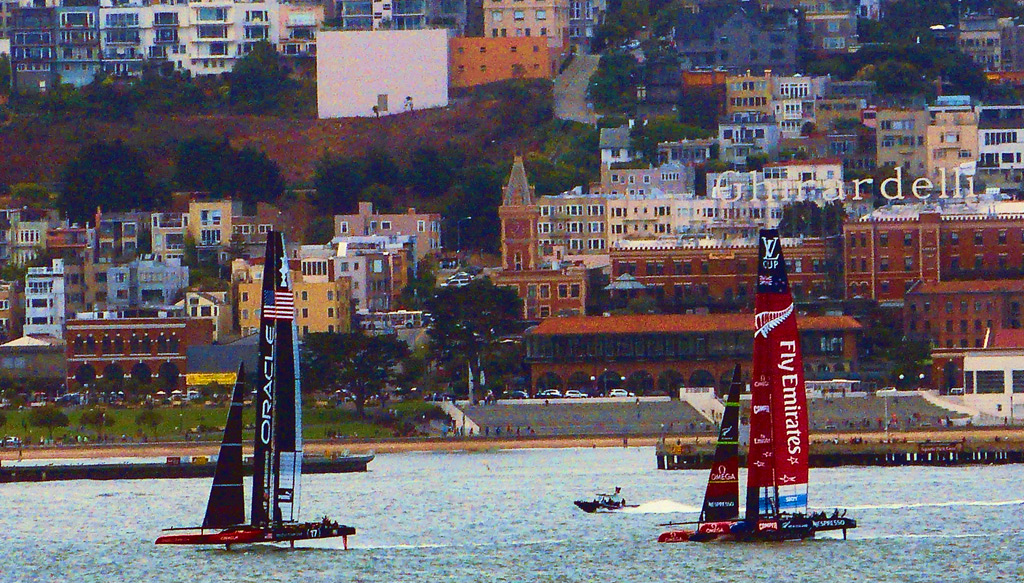 AC72 catamarans racing off Ghirardelli Square